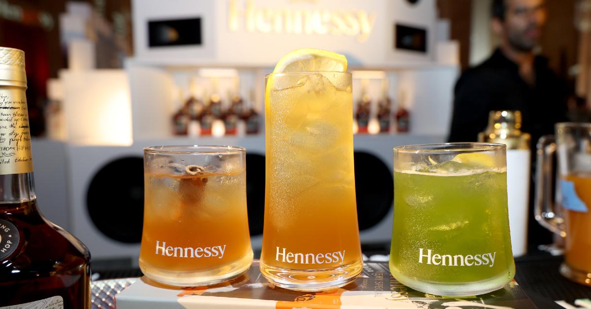 Three specialty Hennessy cocktails on display at a New York 2023 event celebrating Hip Hop’s 50th Anniversary with Hennessy and Nas