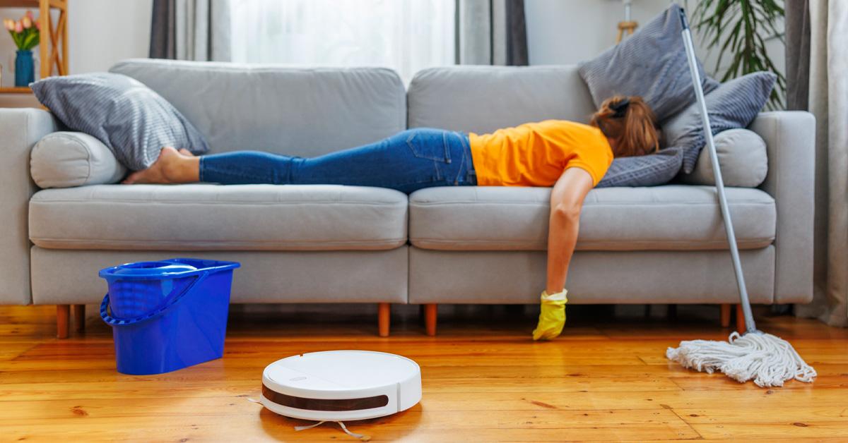 woman passed out on couch while mopping and vacuuming the floor