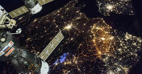 A nighttime view of Western Europe is captured by crew members aboard the International Space Station. Belgium and the Netherlands occupy the middle-right of the frame. (Cover Image Source: NASA)