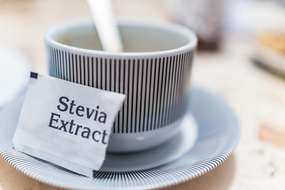 Stevia extract next to a mug stock photo. 