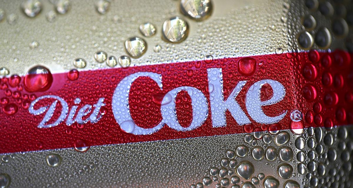 Photograph of a can of Diet Coke. Diet Coke is a product made with aspartame.