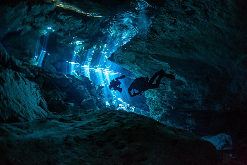 Stock photo of scuba divers in Mexico.