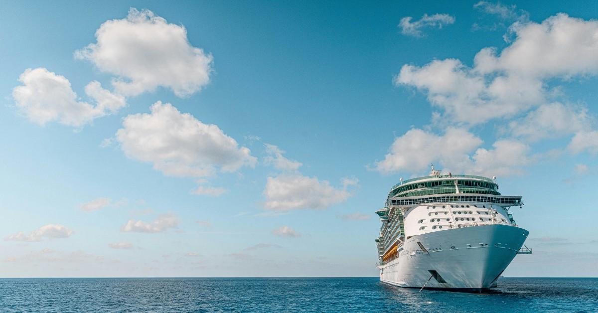 Front view of a cruise ship anchored near shore