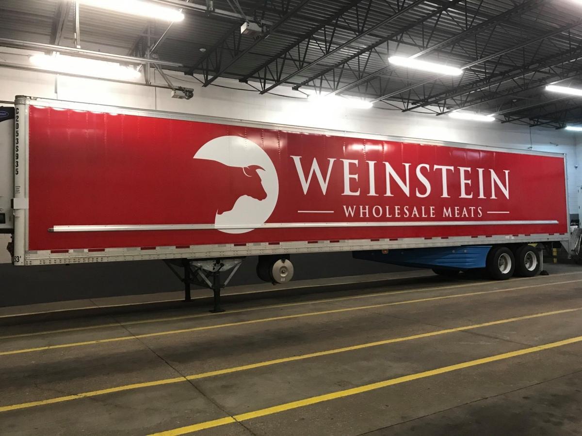 Large truck with Weinstein Wholesale Meats logo