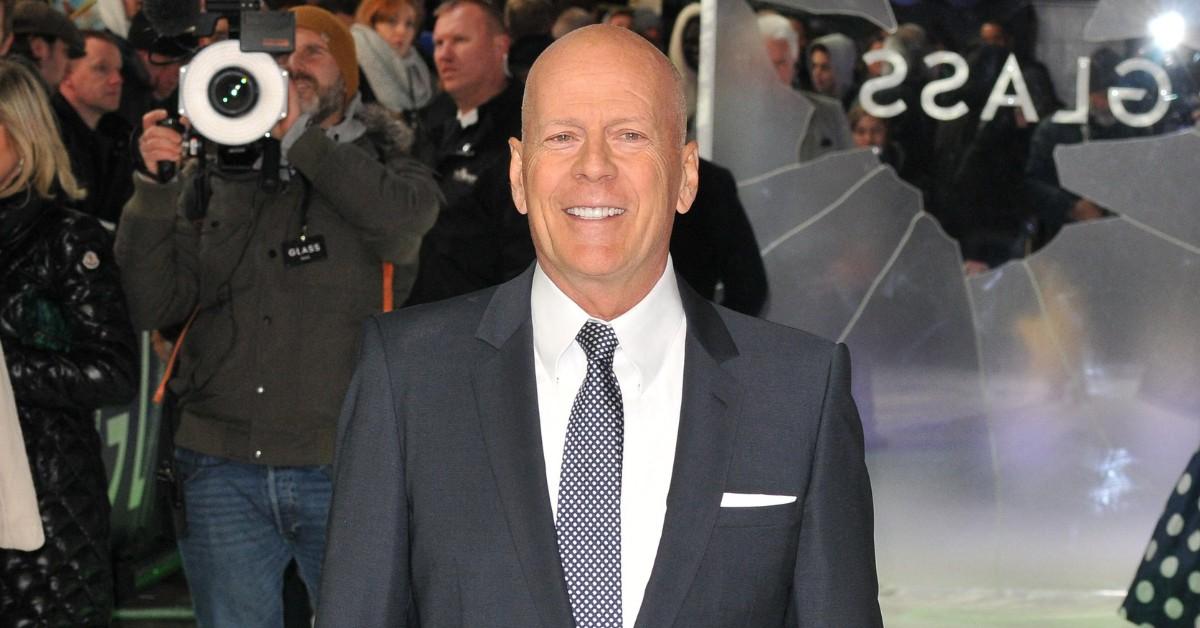 Bruce Willis smiles while promoting a new movie