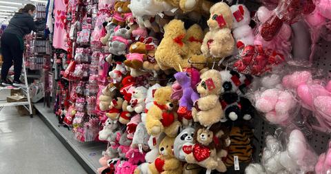A worker stocks shelves with Valentine's Day-themed items for the upcoming holiday in Toronto, Ontario, Canada