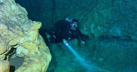 A diver exploring the deepest parts of the Pacific Ocean. (Representative Cover Image Source: Pexels | Francisco Davids)