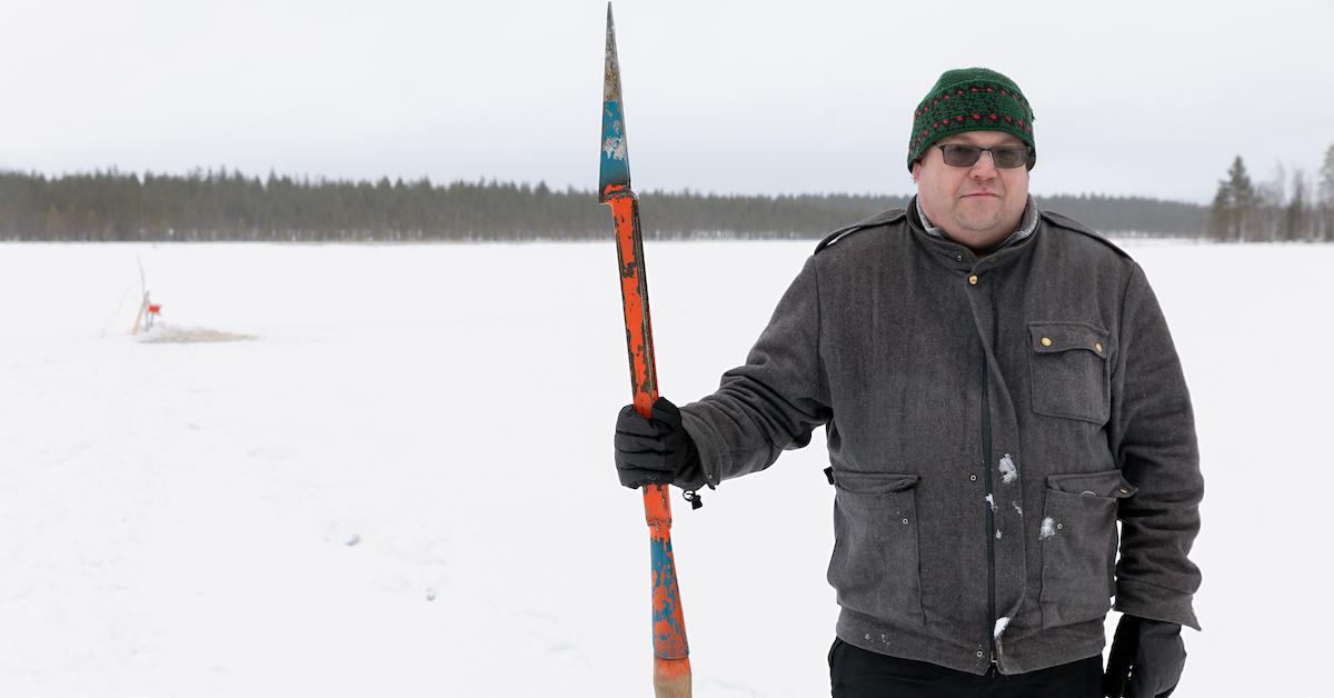 Tero Mustonen in a snowy environment, holding a spear.