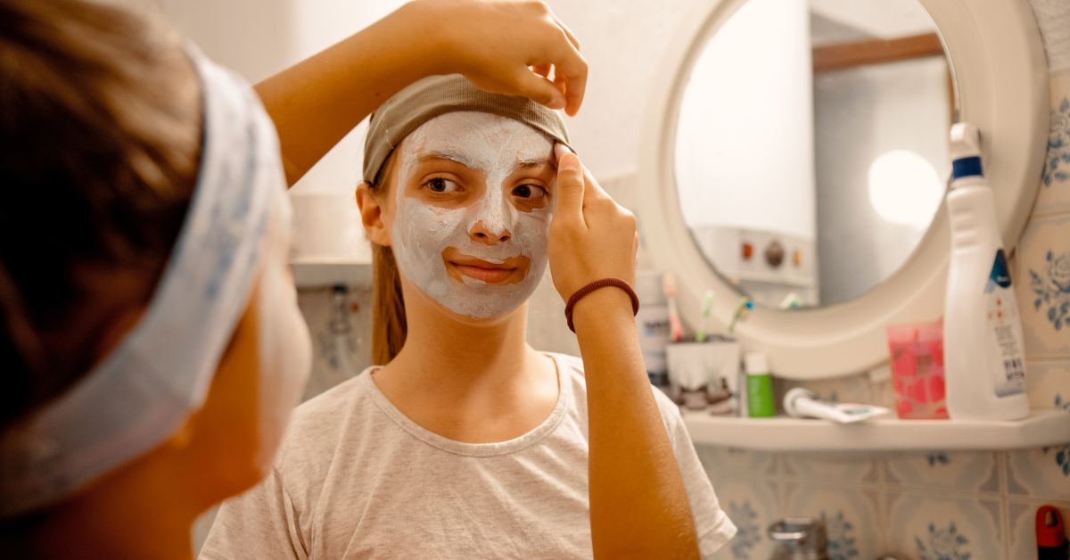 Tweens do facials in bathroom