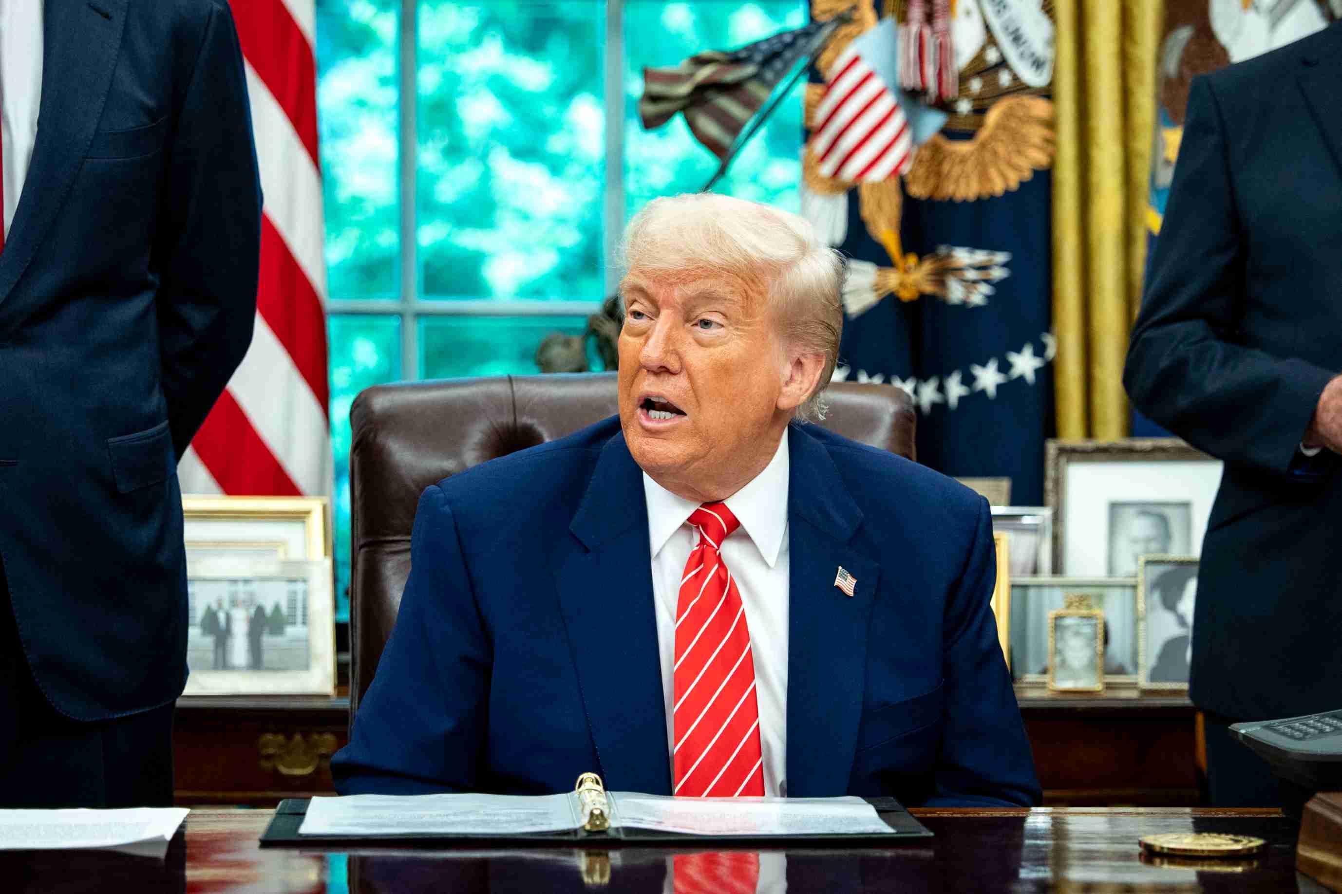 President Donald Trump speaks from his desk about high prices for medicine.