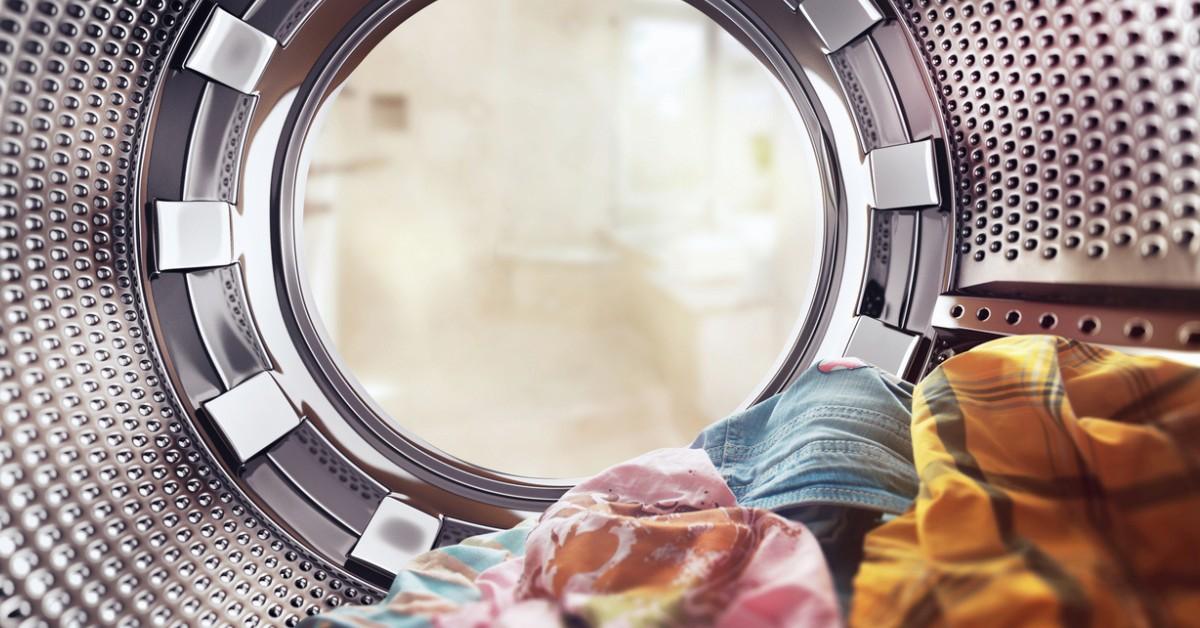 Clothes sitting in the dryer from an interior perspective 