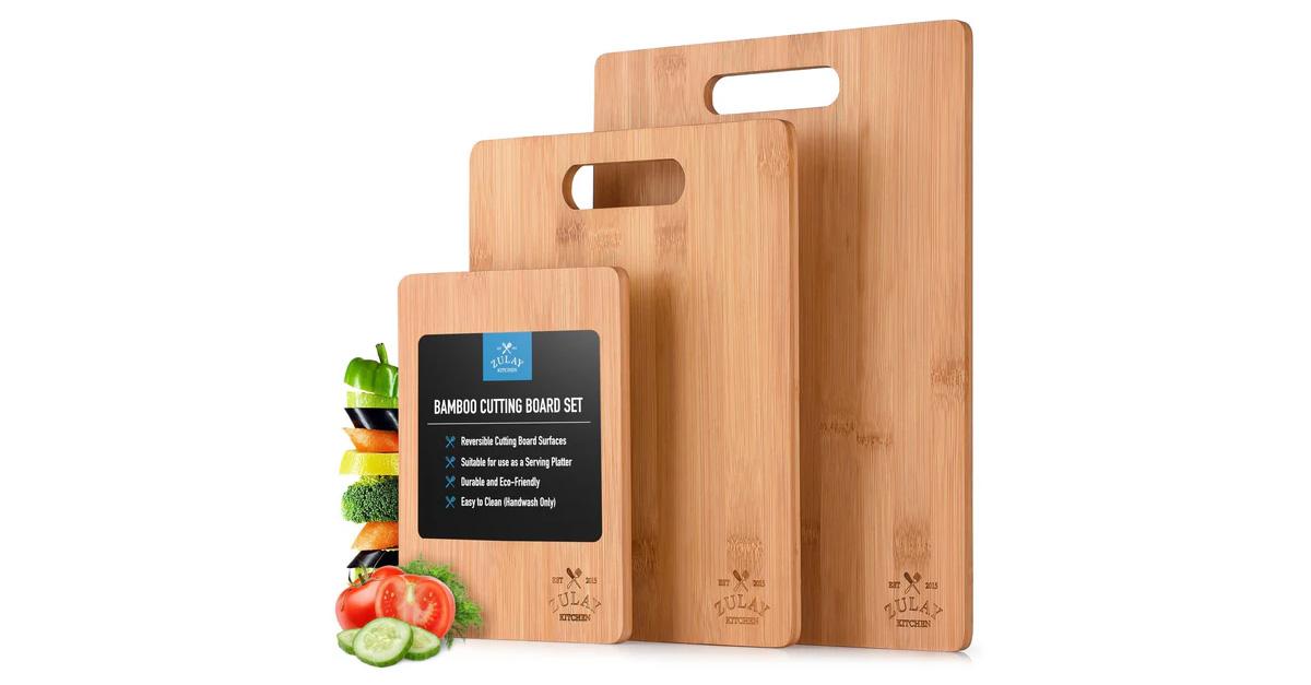 Set of three cutting boards with vegetables