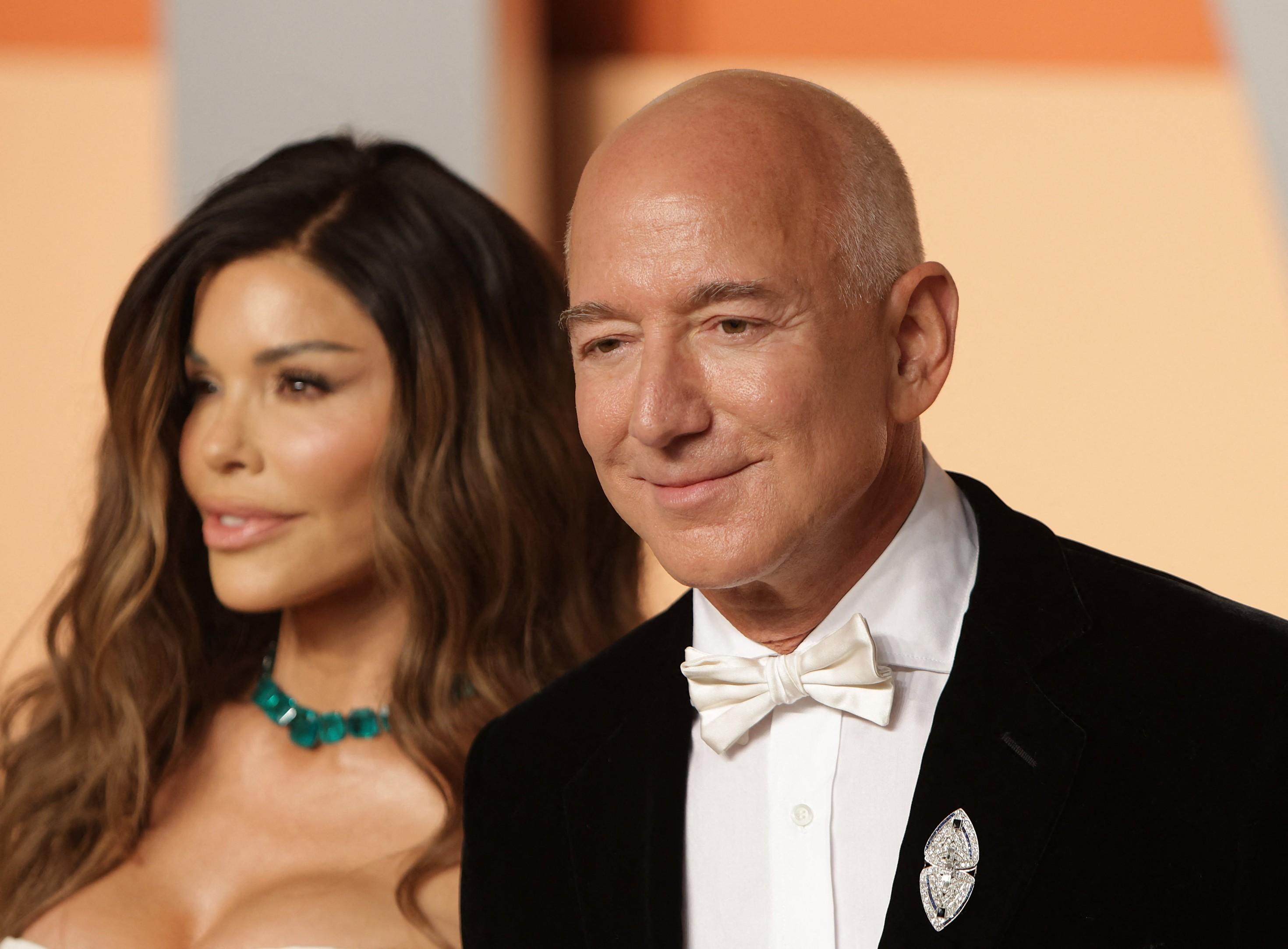 Jeff Bezos and Lauren Sanchez appear at the Vanity Fair Oscar Party in March 2025.