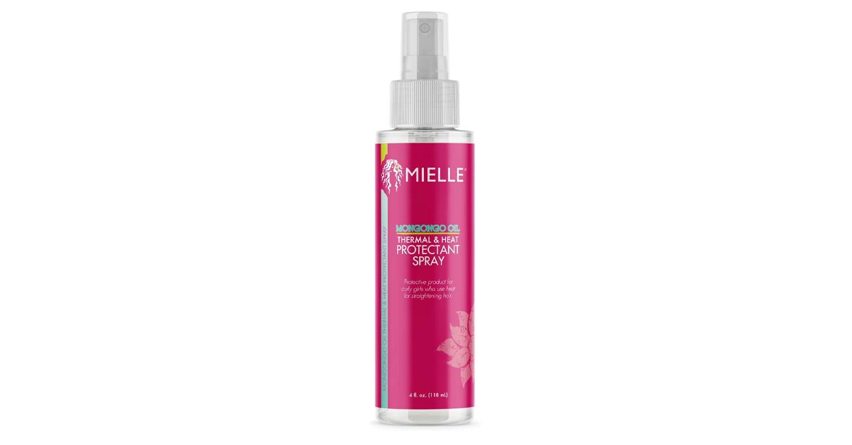 heat protectant spray in pink and white bottle