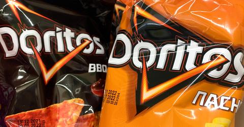 Close-up photo of black and orange bags of Doritos