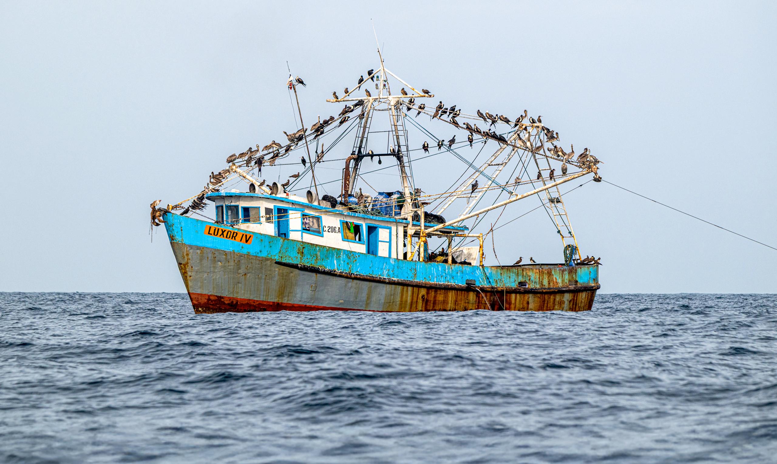 A boat sails on the Gulf of Panama waters.