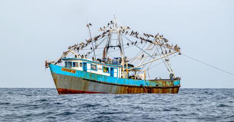 A boat sails on the Gulf of Panama waters.