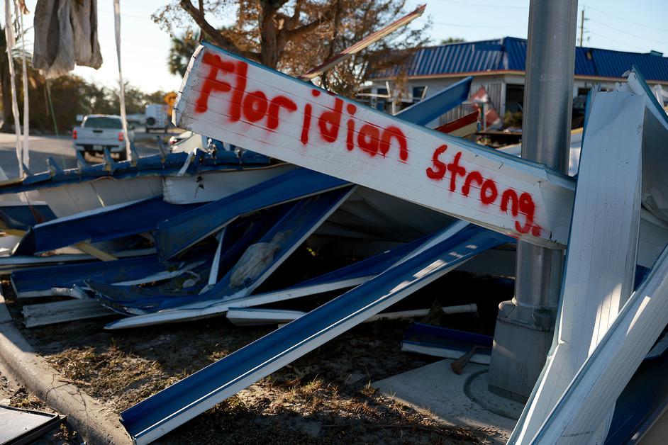 Spray-painted sign after Hurricane Ian. 