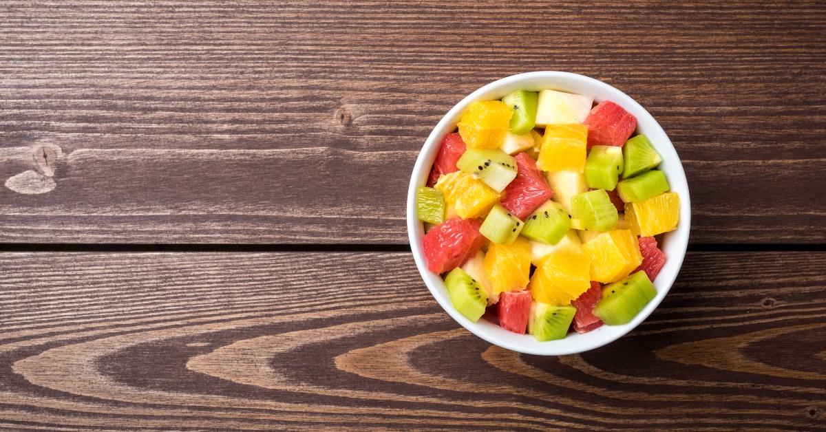 Bowl of mixed fruit including pineapple. 