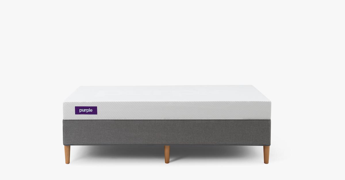 Purple brand mattress on a white background