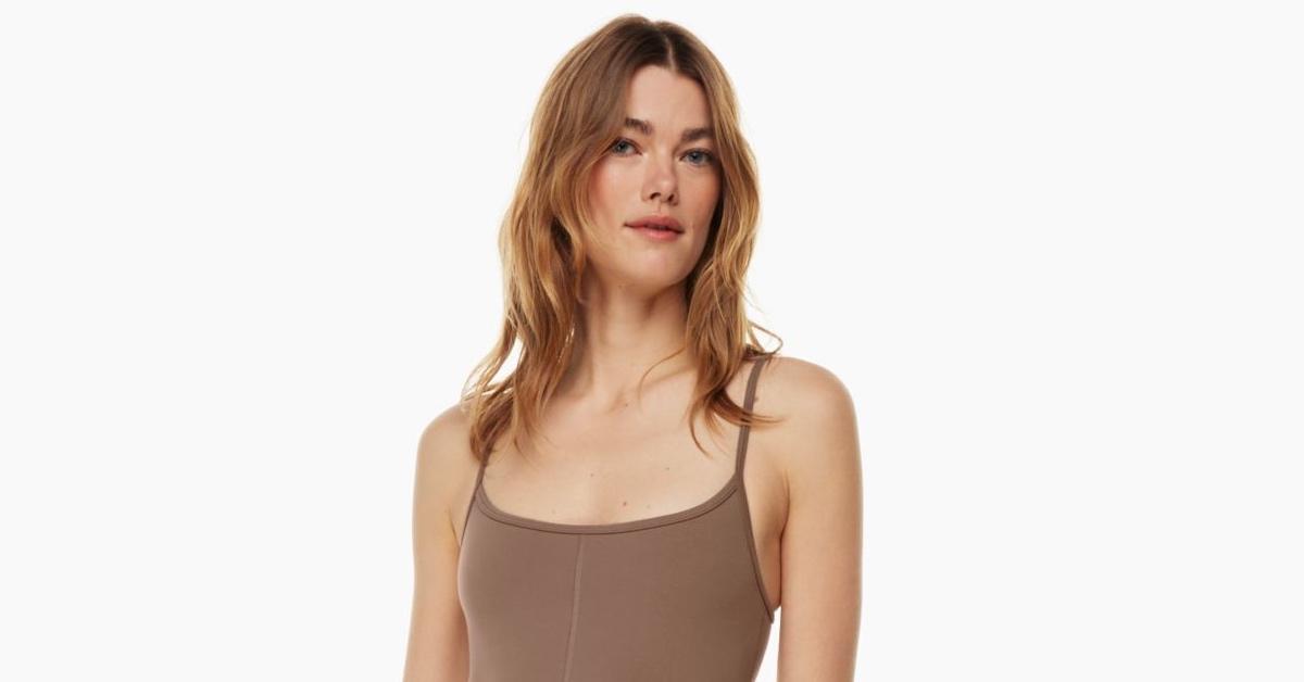 A model wears an Aritzia jumpsuit. 