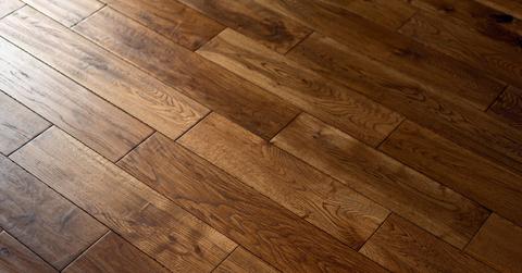 A photo of dark prefinished hardwood floors
