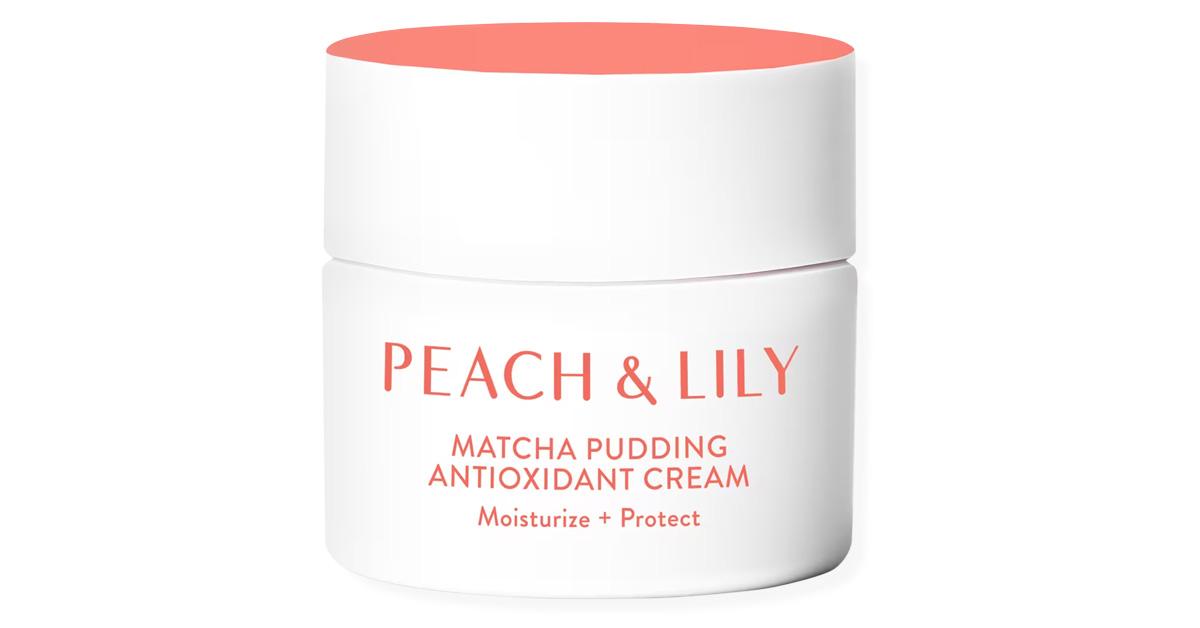 White and peach-colored tub of Peach & Lily Matcha Pudding Antioxidant Cream 