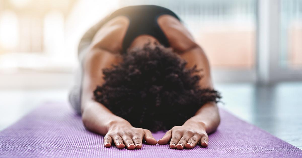 Woman using sustainable yoga mat