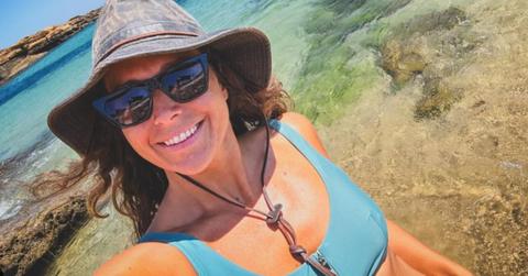 Giulia Manfrini poses for a selfie in front of the ocean