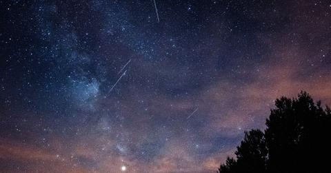 Meteors streak across the night sky