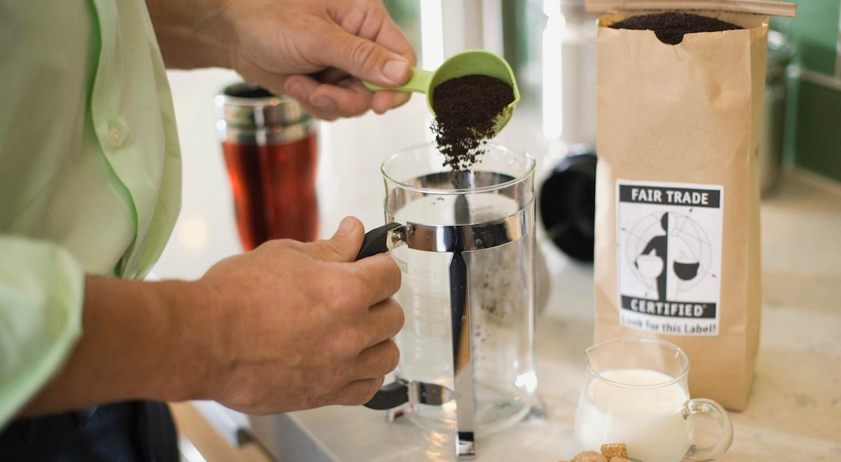 Man making fair trade coffee