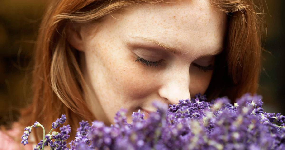 Woman sniffing lavender