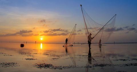Fishermen in the morning at the Mekong Delta (Representative Cover Image Source: Getty Images | Nguyen Lam)