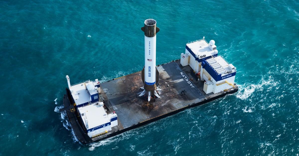 The New Glenn booster sits on a floating platform