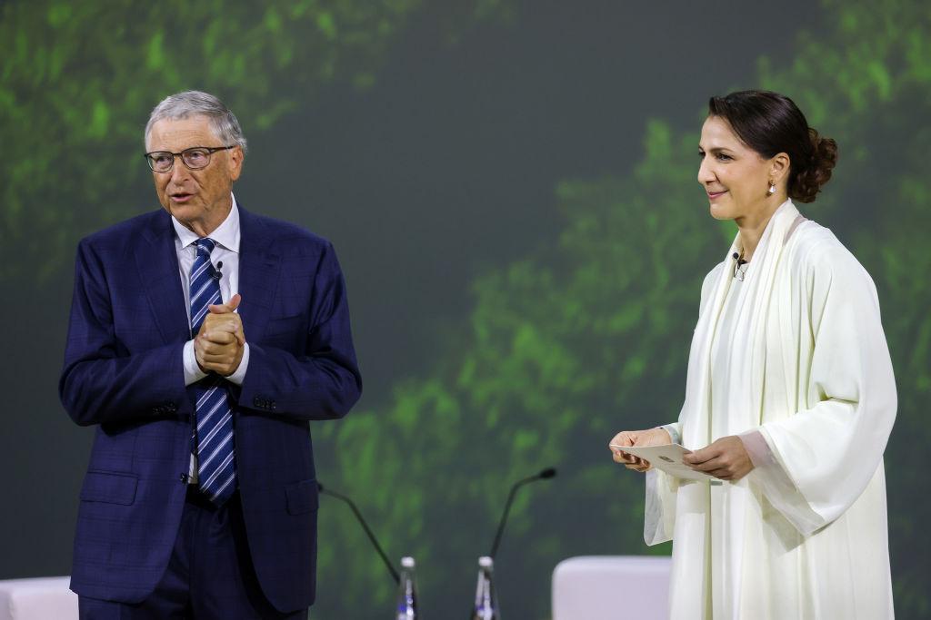 Mariam Almheiri, Minister of Climate Change and Environment in the United Arab Emirates, and Bill Gates attend the Leaders' Event: Transforming Food Systems in the face of Climate Change at Al Waha Theatre during the UN Climate Change Conference COP28 at Expo City Dubai on December 1, 2023 in Dubai, United Arab Emirates