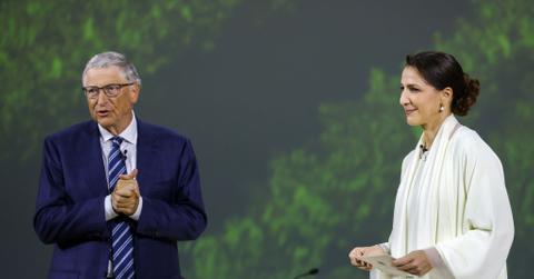 Mariam Almheiri, Minister of Climate Change and Environment in the United Arab Emirates, and Bill Gates attend the Leaders' Event: Transforming Food Systems in the face of Climate Change at Al Waha Theatre during the UN Climate Change Conference COP28 at Expo City Dubai on December 1, 2023 in Dubai, United Arab Emirates