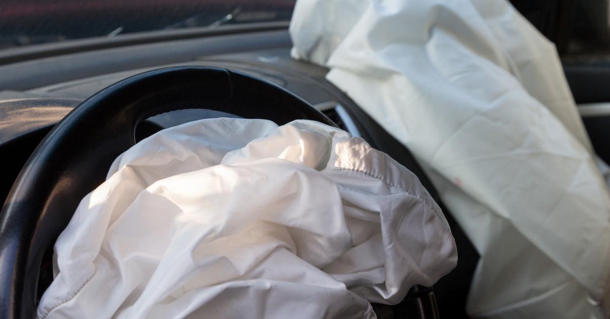 Two air bags inflated in a car.