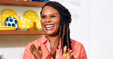 Tabitha Brown smiles in a kitchen
