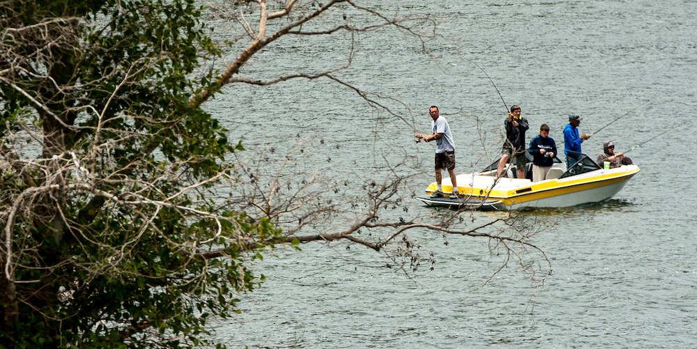 A group of people fishing on Pyramid Lake.