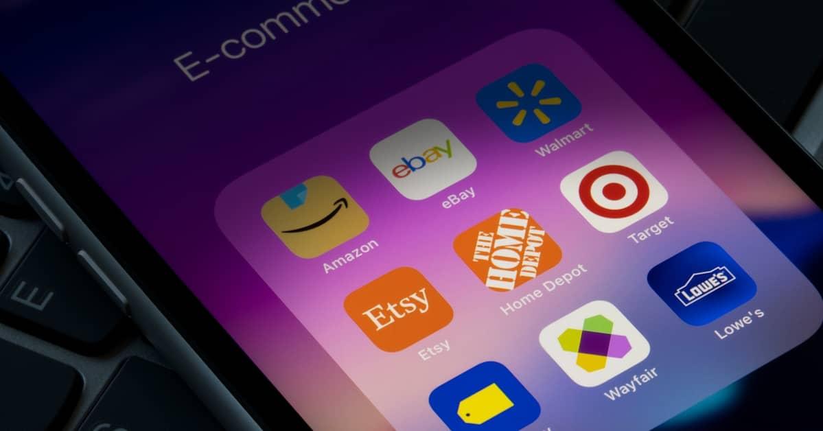 Closeup on smartphone screen with online shopping apps, including Wayfair, Etsy, Target, etc.