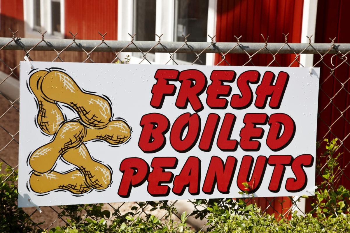 large sign for "Fresh Boiled Peanuts"