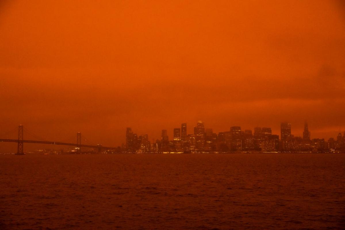 San Francisco and Golden Gate Bridge with orange sky