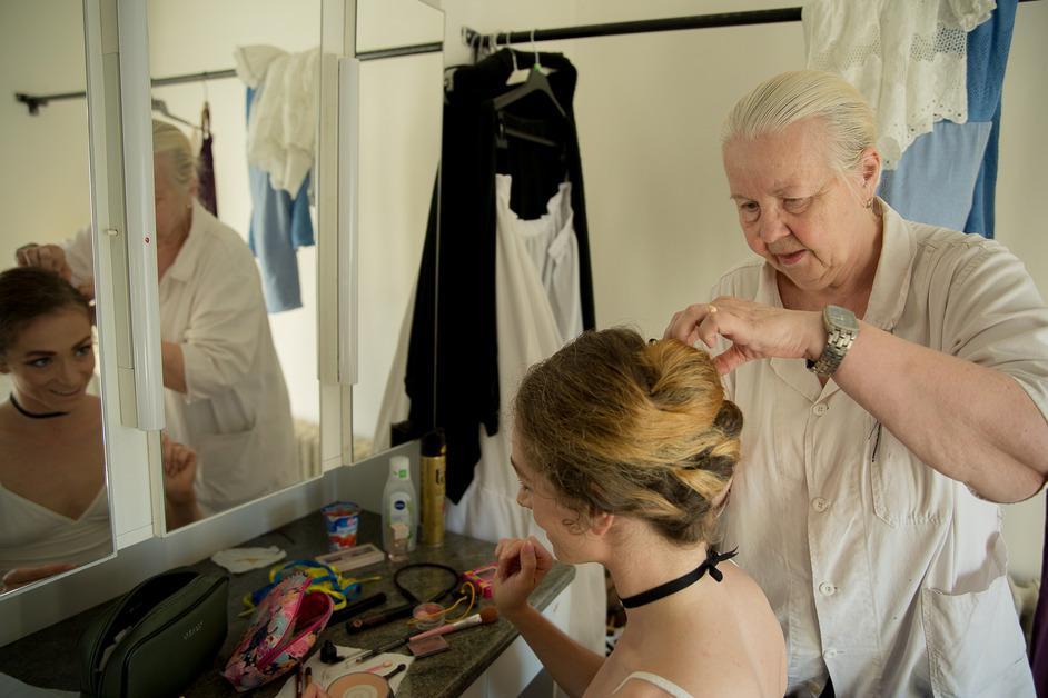 Ballerina getting hair done