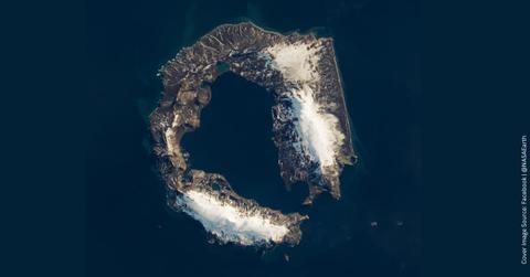 Satellite image of Deception Island in Antarctica. (Cover Image Source: Facebook | @NASAEarth)