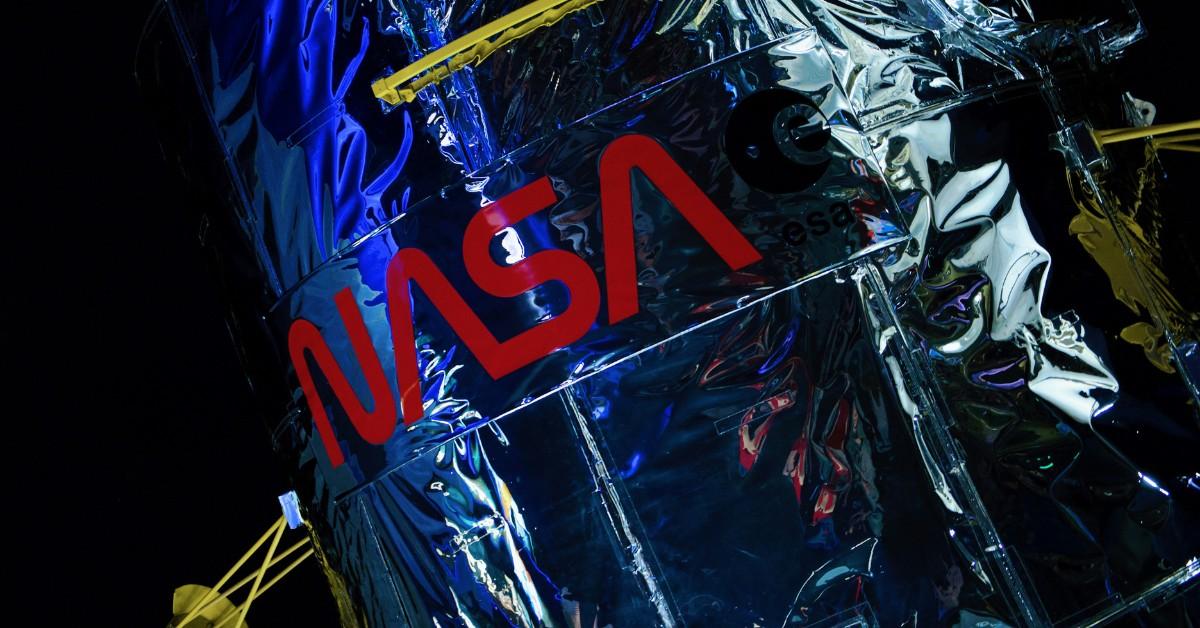 The NASA logo appears on the front of one of the organizations devices in big bold letters