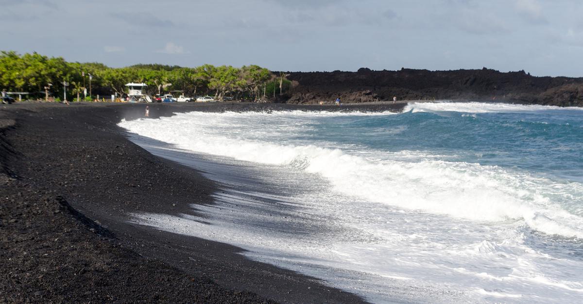 Rough surf at the edge of Pohoiki shoreline.