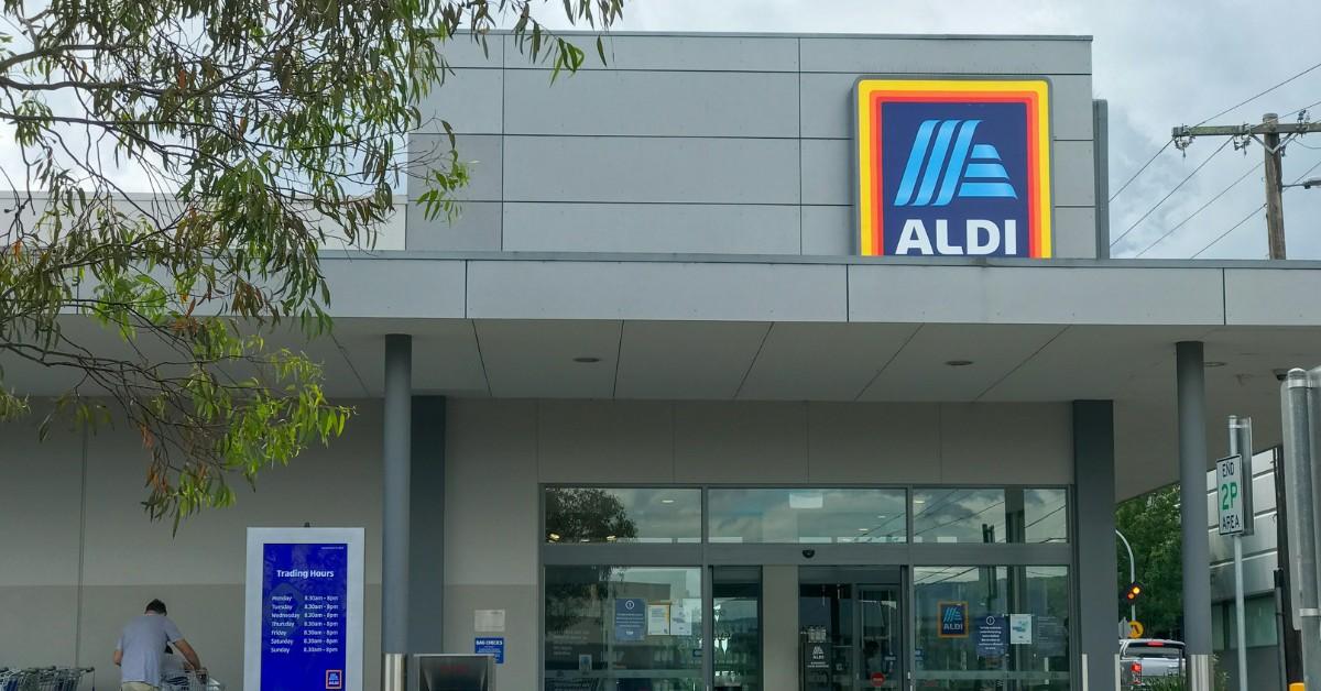 An Aldi storefront on a cloudy day