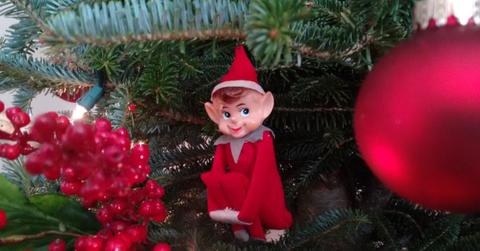 An elf in a Christmas tree.