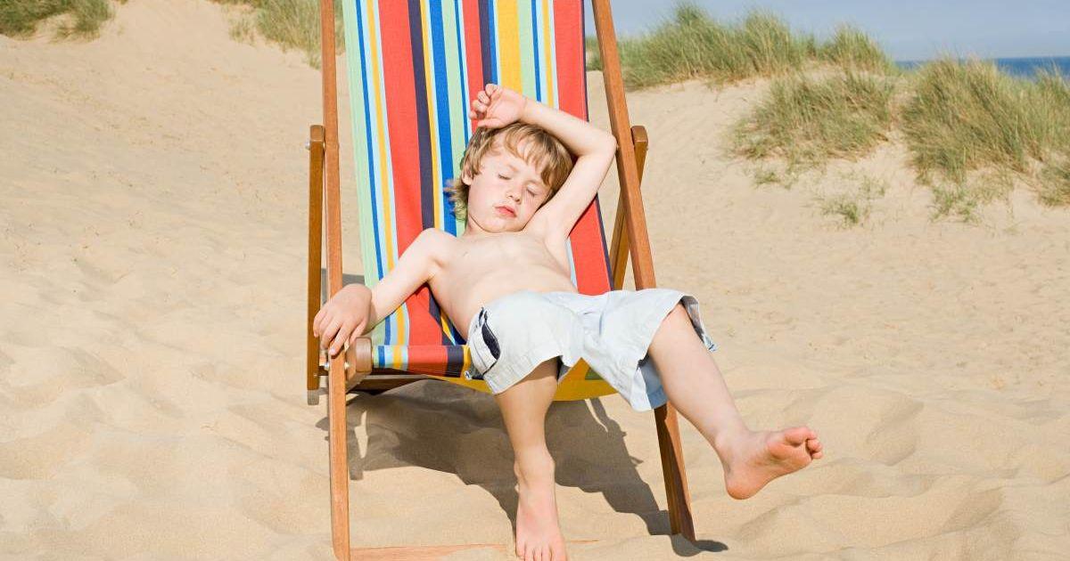 A tired little boy is sleeping on the deck chair on a beach. (Representative Cover Image Source: Getty Images | Image Source)