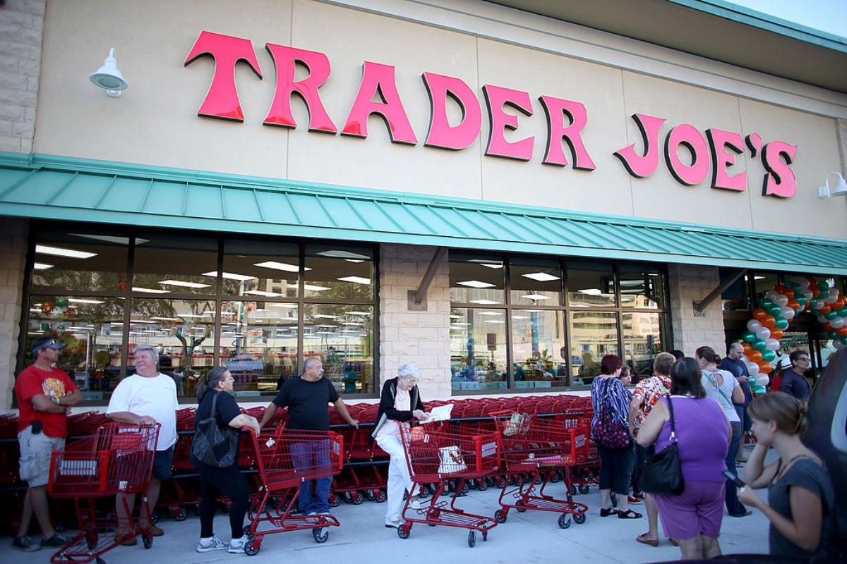 Shoppers wait outside a new Trader Joe's store